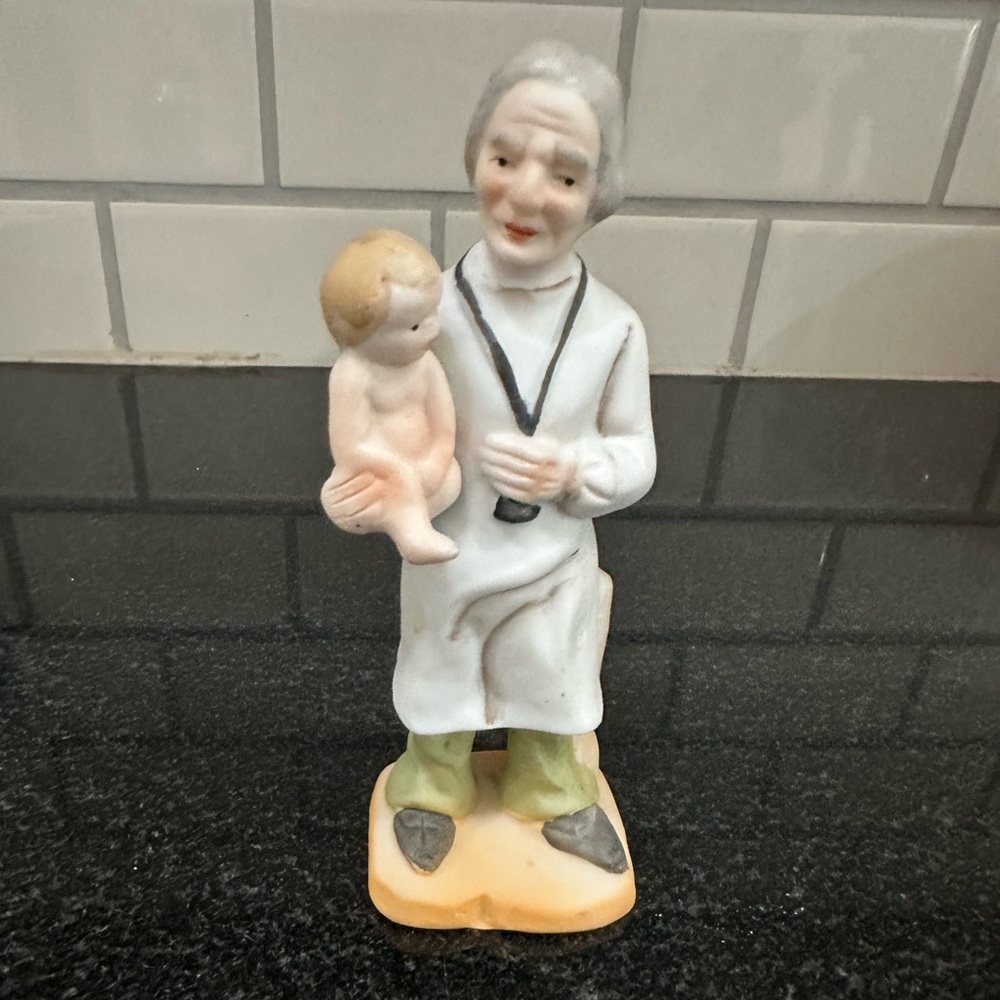 Vintage Ceramic doctor Figurine of doctor with Child